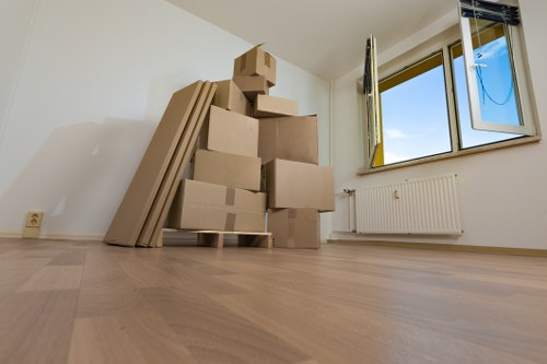 Office removals planning in Neasden with desks and boxes ready for transport