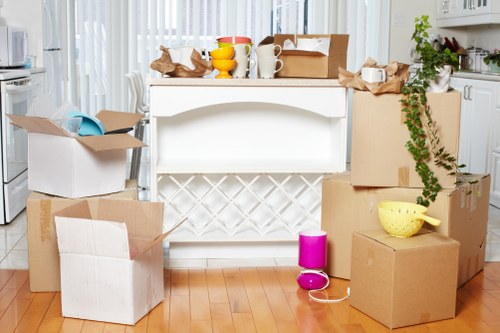 Careful packing of household items for a local Neasden home move