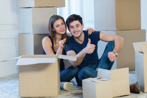 Loading furniture and boxes into a moving van in northwest London