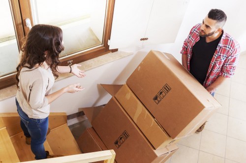 Local movers handling household items near Neasden homes