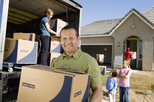 Packed boxes and furniture ready for house removals