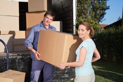 Loading furniture for a man with van removal in Neasden