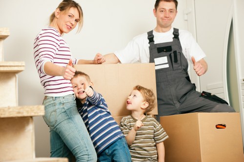 Truck loading furniture and boxes for a Neasden relocation